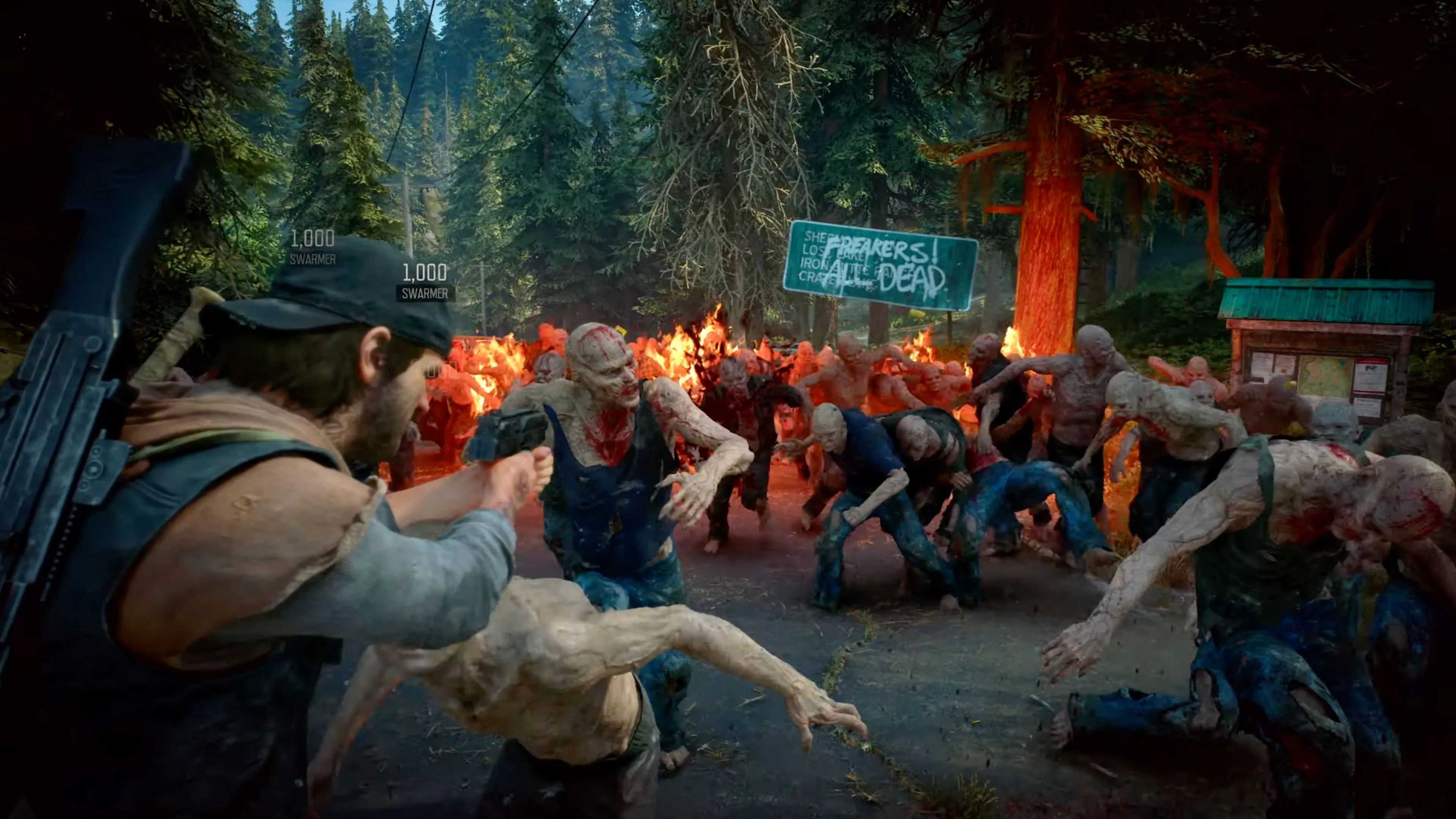 Deacon St. John đối mặt với bầy Freaker khổng lồ, minh họa cường độ hành động trong Days Gone Remastered