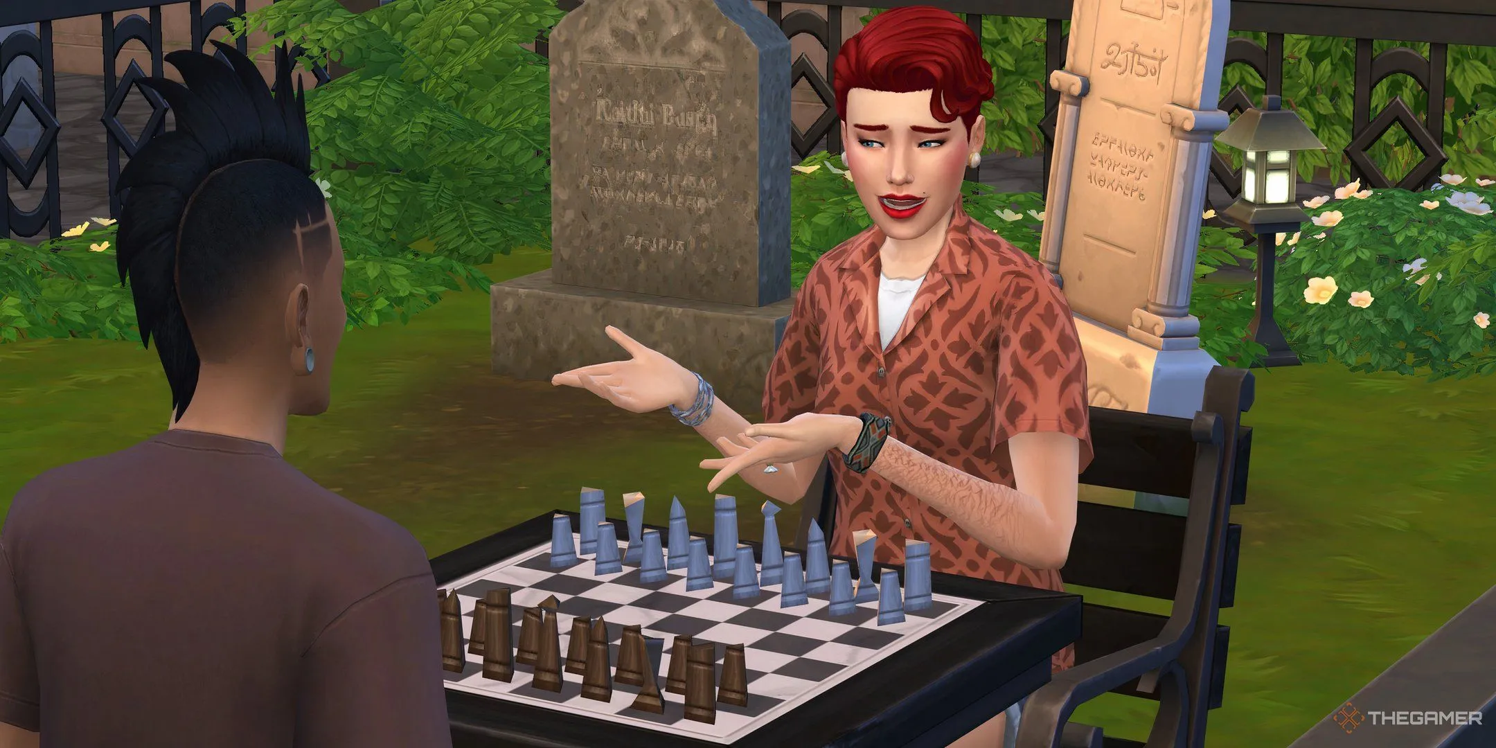 Hai nhân vật Sims chơi cờ vua gần mộ trong The Sims 4
