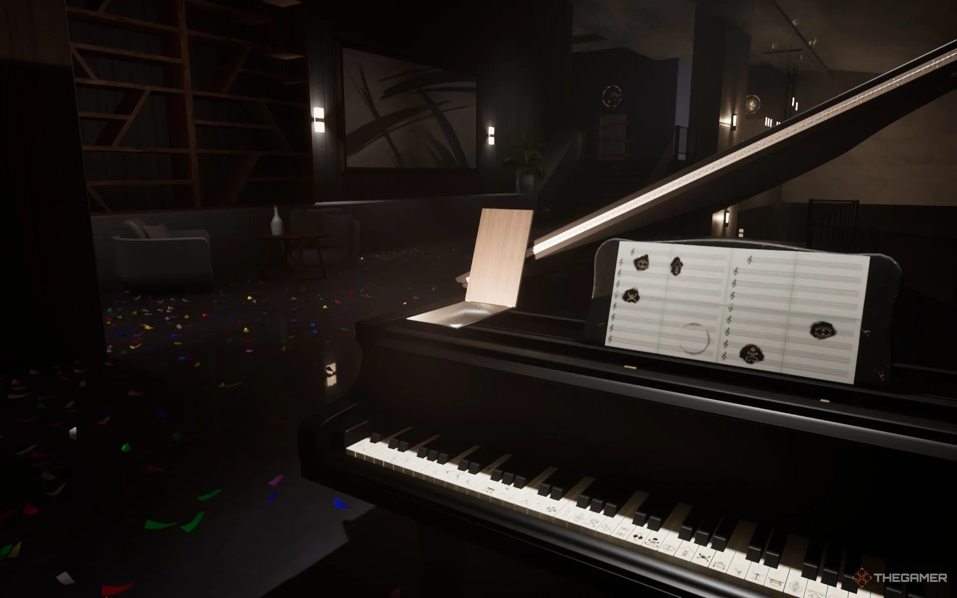 Người chơi lấy băng cassette từ ngăn bí mật của đàn piano sau khi giải đố thành công trong Dead Take.